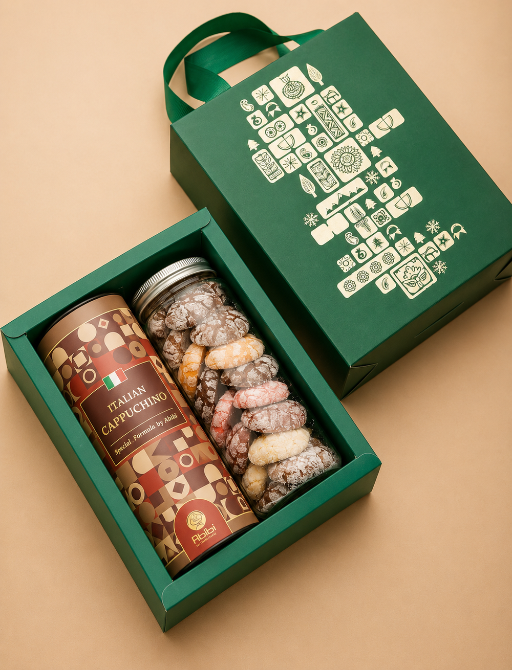 Green gift box with Italian Cappuccino can and assorted candies on a beige background