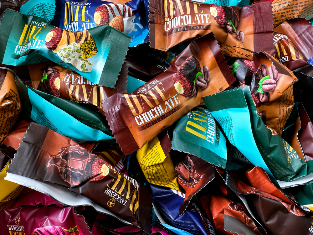 Assorted chocolate bars in various packaging colors.