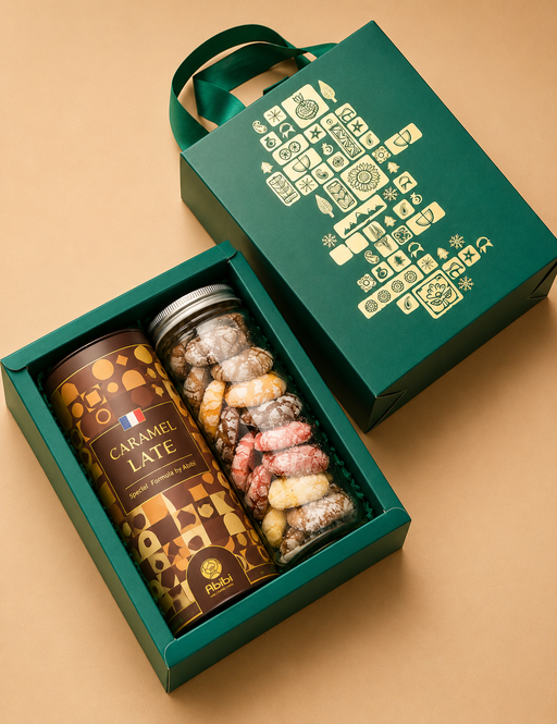 Gift set with a mug, cookies, and a box on a beige background